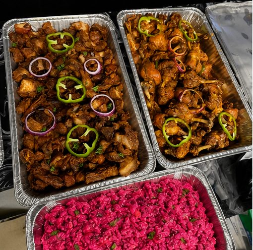 Catering trays of chicken and beet salad from 509 Restaurant and Lounge